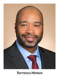 Torrence Hinton, man in white striped gray business suit with red tie